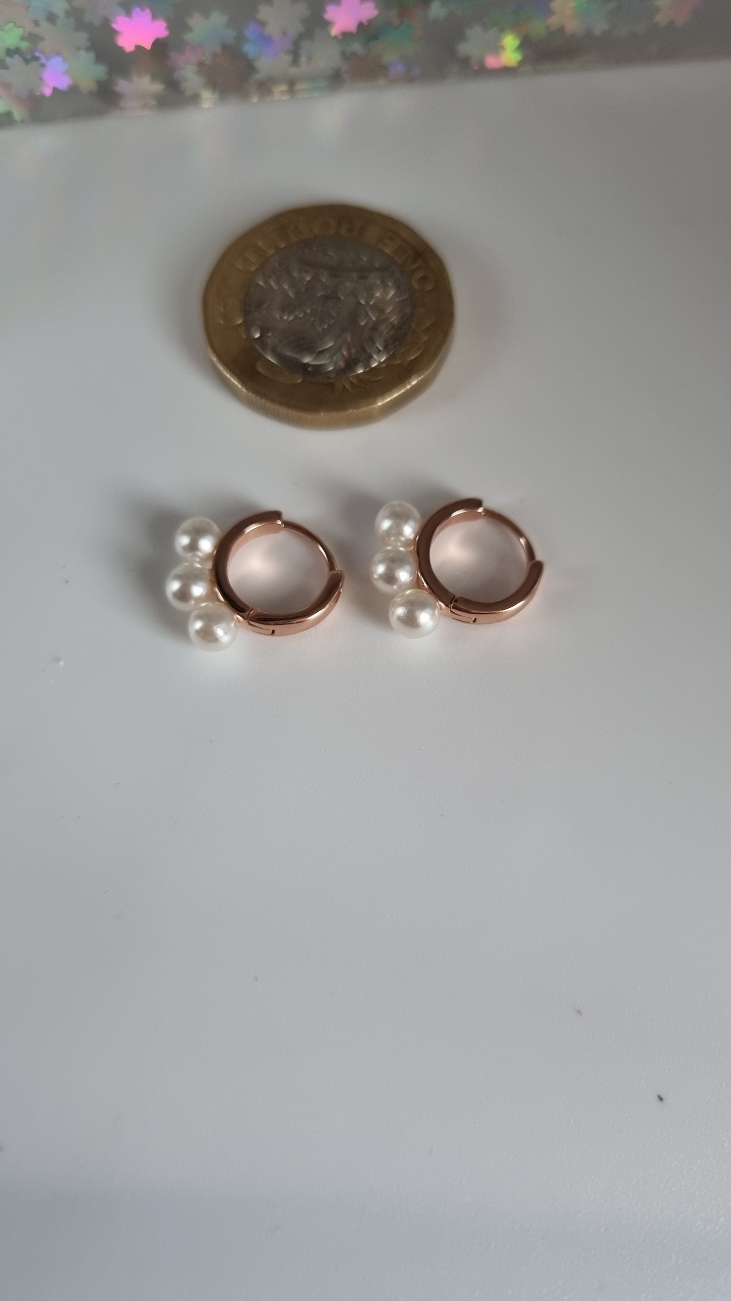 Rose gold plated earrings with shell pearls