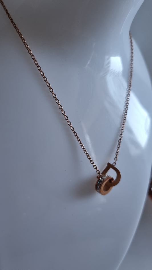 StainlessSteel rose gold plated necklace with sw.crystal and D very beautiful