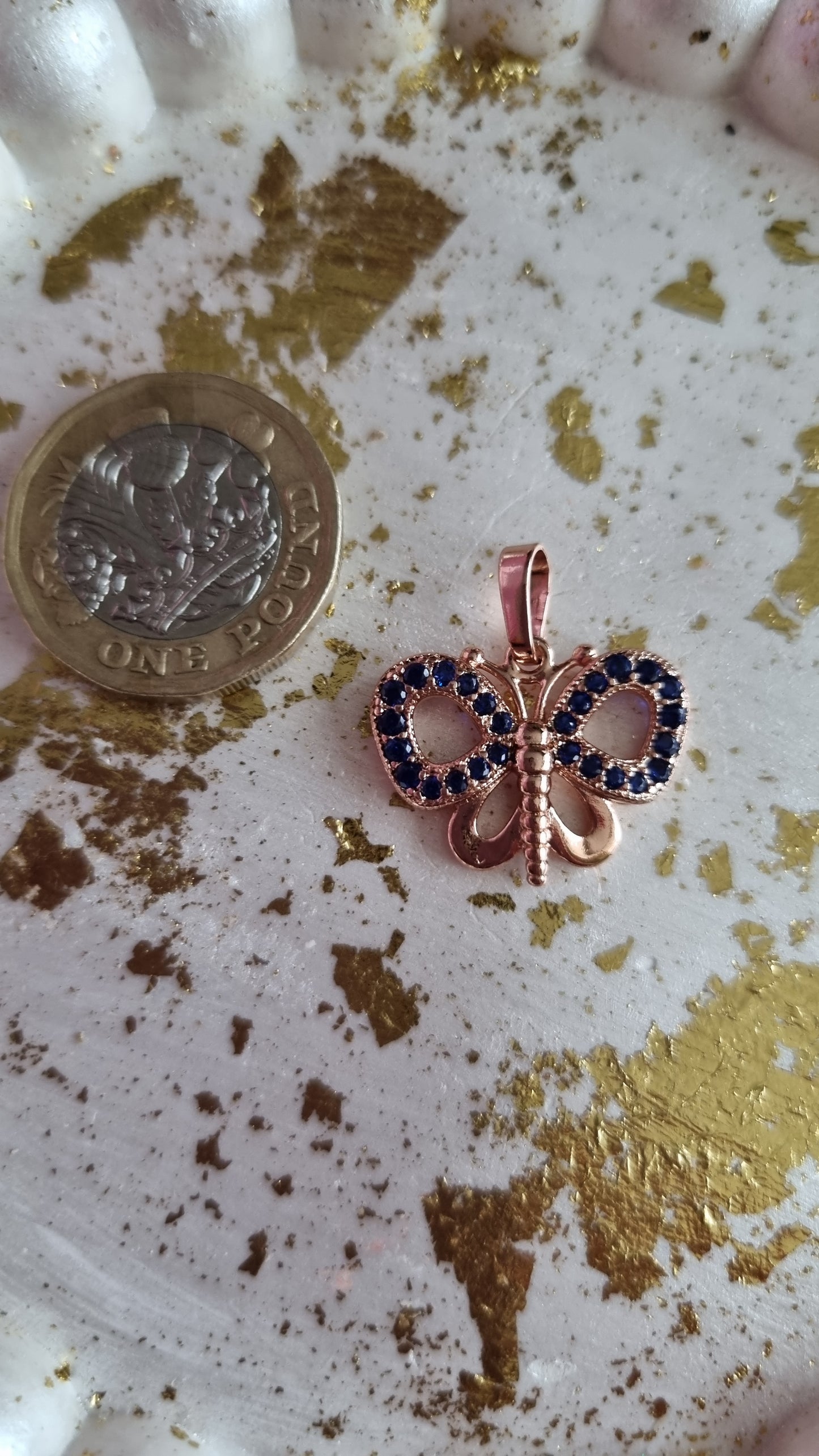 Rose gold plated pendant with zircon stone blue colour