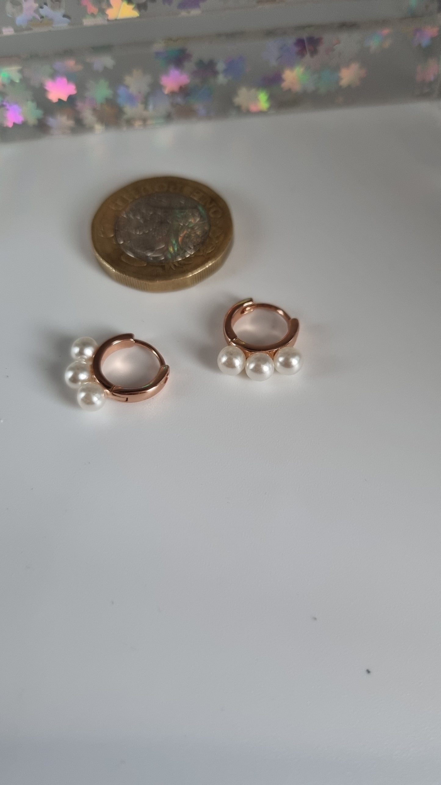 Rose gold plated earrings with shell pearls