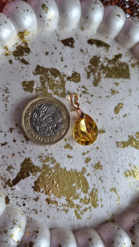 18kr.gold plated pendant with sw.crystal yellow