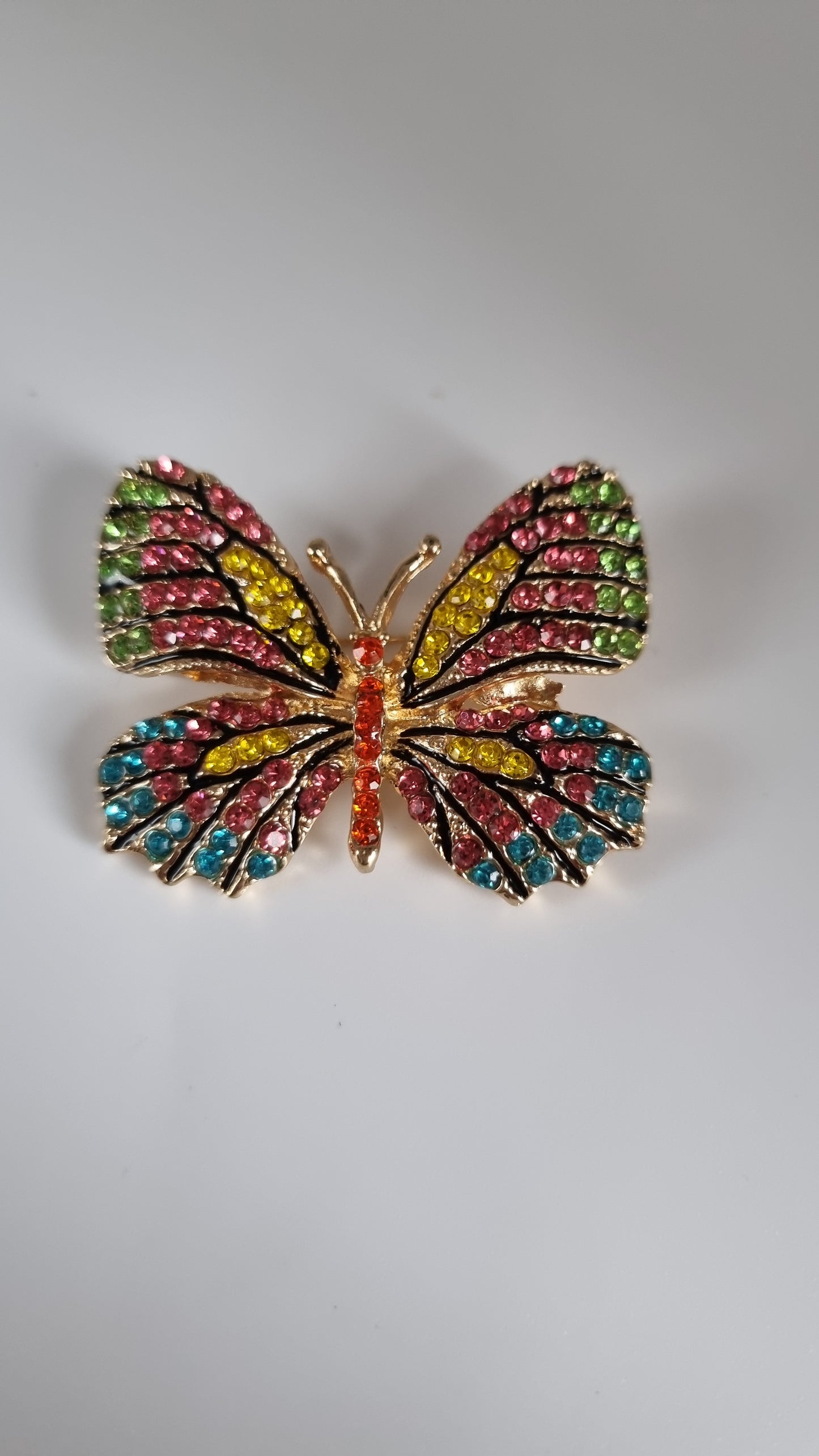 Zircon crystal butterfly brooche 14kr.gold plated