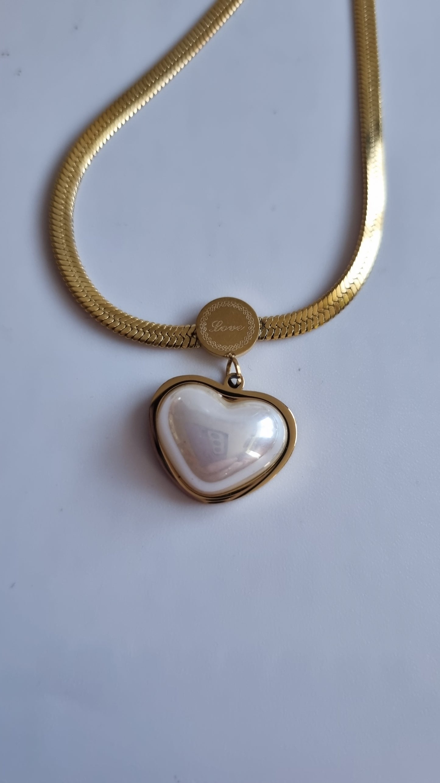 Stainless steel necklace with shell pearl heart